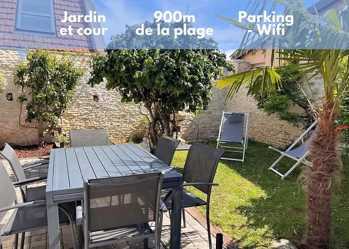 Photo de Maison chaleureuse - Jardin, à 900m de la plage